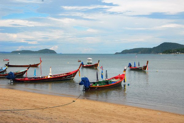 Long-tail boats pulled up at Rawai Beach, Phuket