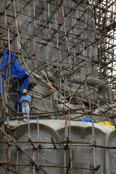 Construction worker for scale, Phuket Big Buddha