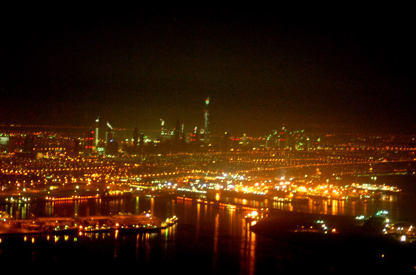 Dubai Creek at night with Sheikh Zayed Road in the distance