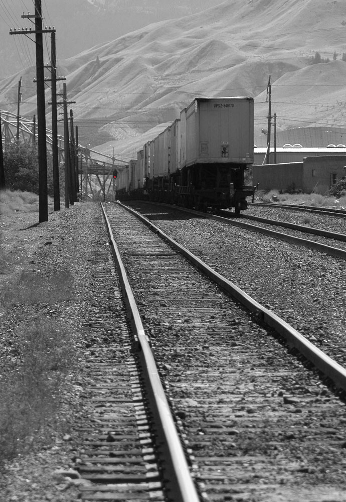Red block signal (visible at head of train in Original image)