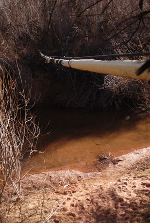 Natural gas pipeline suspended above Kane Creek