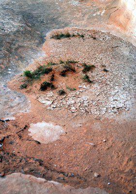 Low point inside the alcove: dried-up puddle