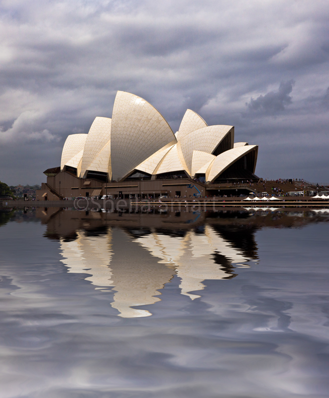 Stormy Sydney Opera House with reflection