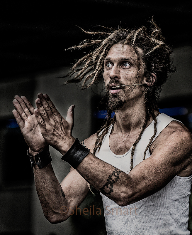 Busker with dreadlocks 