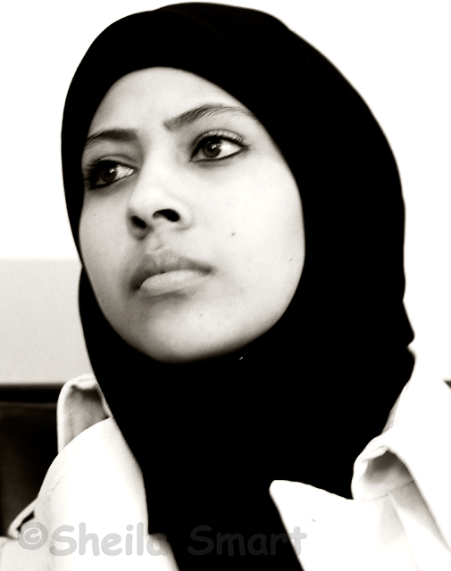 Young Moslem woman in hijab on train