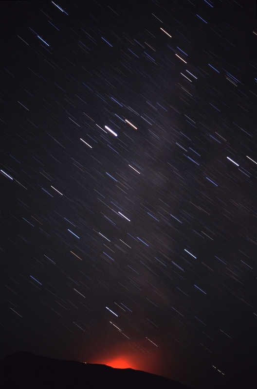 Star trails over Stromboli volcano, Italy