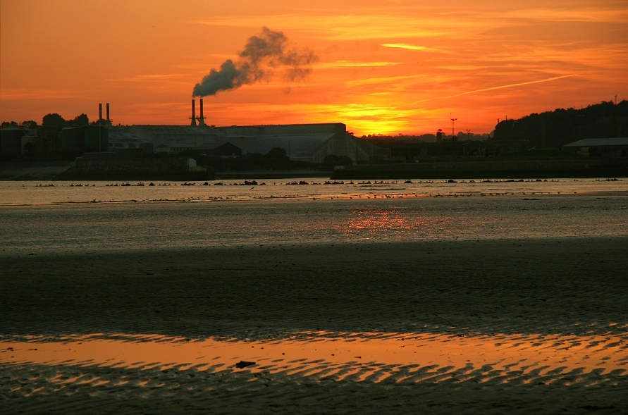Beach and clay-drying plant, after sunset
