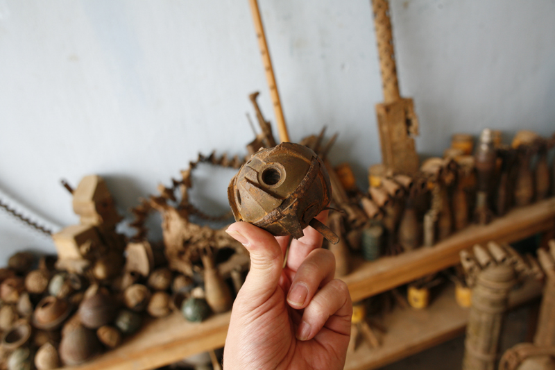 Bombies (sub-munition bomblets) and other military junk, Phonsavan, Laos