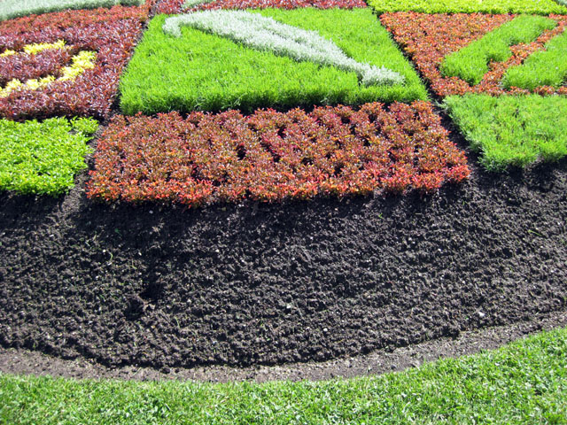The carpet garden features symbols of