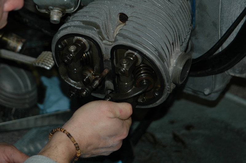Seating the seals by installing the bottom cylinder stud nuts first.