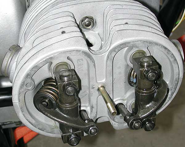 Reinstall pushrods & rocker arm assemblies.