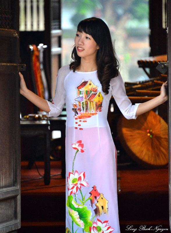 Young Lady in colorful Ao Dai, Temple of Literature, Hanoi, Vietnam  