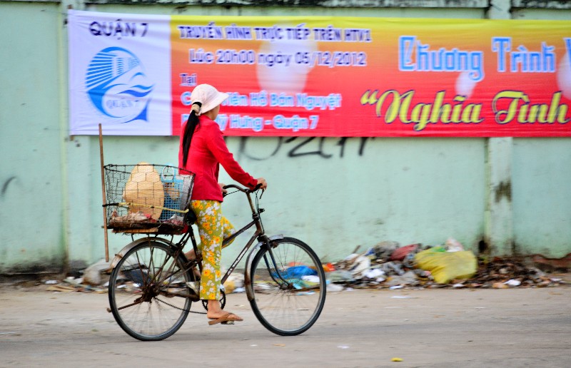 crusing by trash, Nguyen Thi Thap street,  Saigon,  district 7, Vietnam  