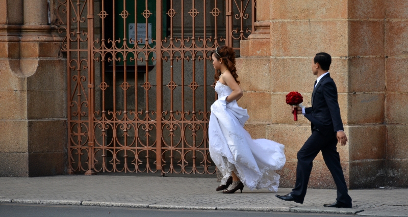 socks in heels and wedding dress, Saigon Notre-Dame Cathedral, Saigon, Vietnam  