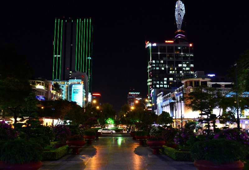 tall buildings from park in front Saigon City Hall, Saigon, Vietnam 