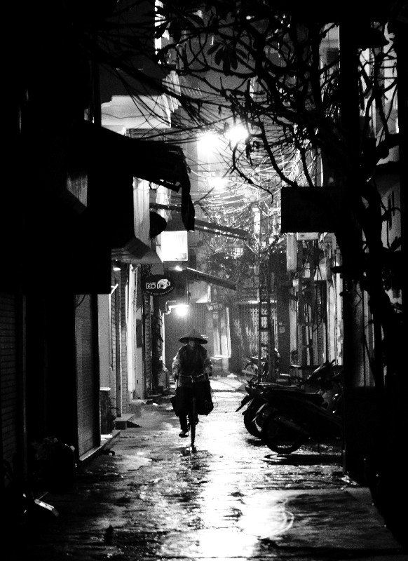 lone biker, Hanoi Old Quarter, Hanoi, Vietnam 