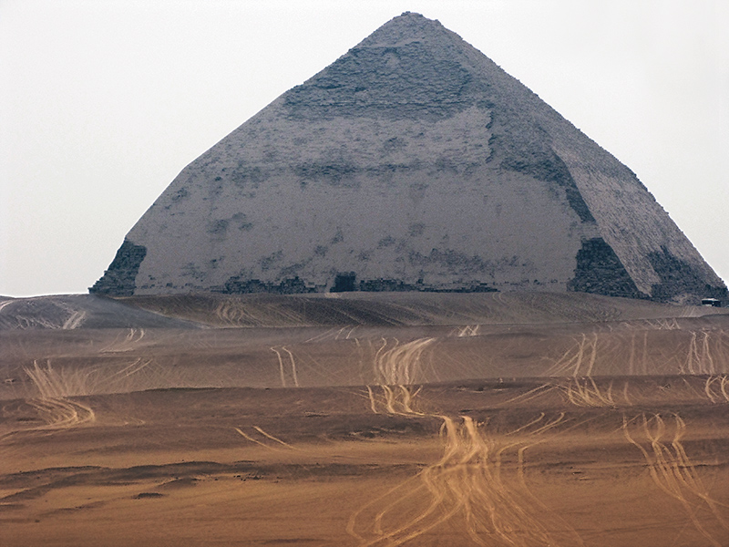 The Bent Pyramid, built by Senefru, father of Cheops/Khufu <br>Much of the limestone covering remains. Dahshur.