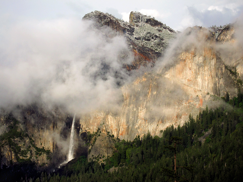 Clearing storm. BridalVeil Fall under dusk-lit Cathedral Rocks. 6:59 pm, 5/25/12. S95 #4569