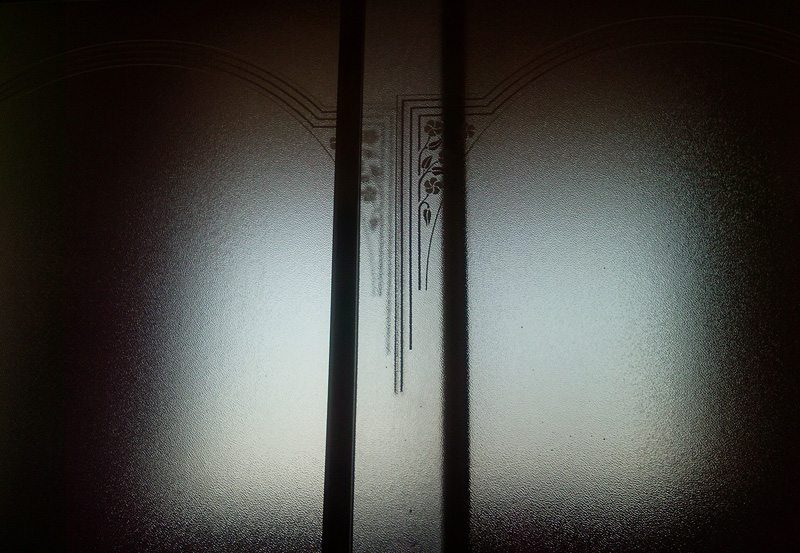 Texture of glass shower doors - translucent window behind