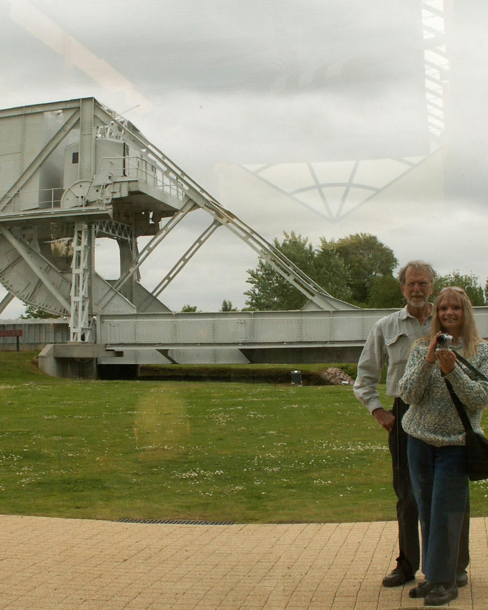 Self portrait with original Benouville (renamed Pegasus) Bridge in background