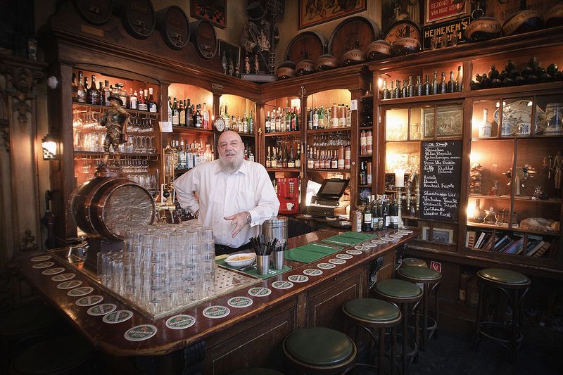 Retired bartender Jaecques André still fills in at the old Amsterdam bar where he worked for years