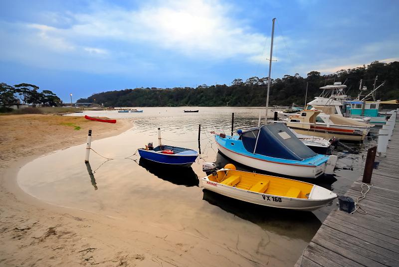 Boats moored on the lake