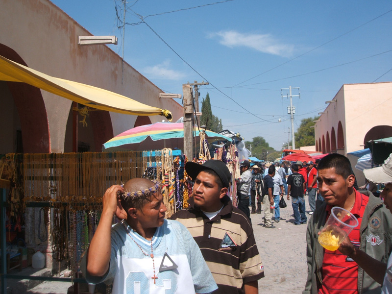 trying on a crown of thorns, Atotonilco market