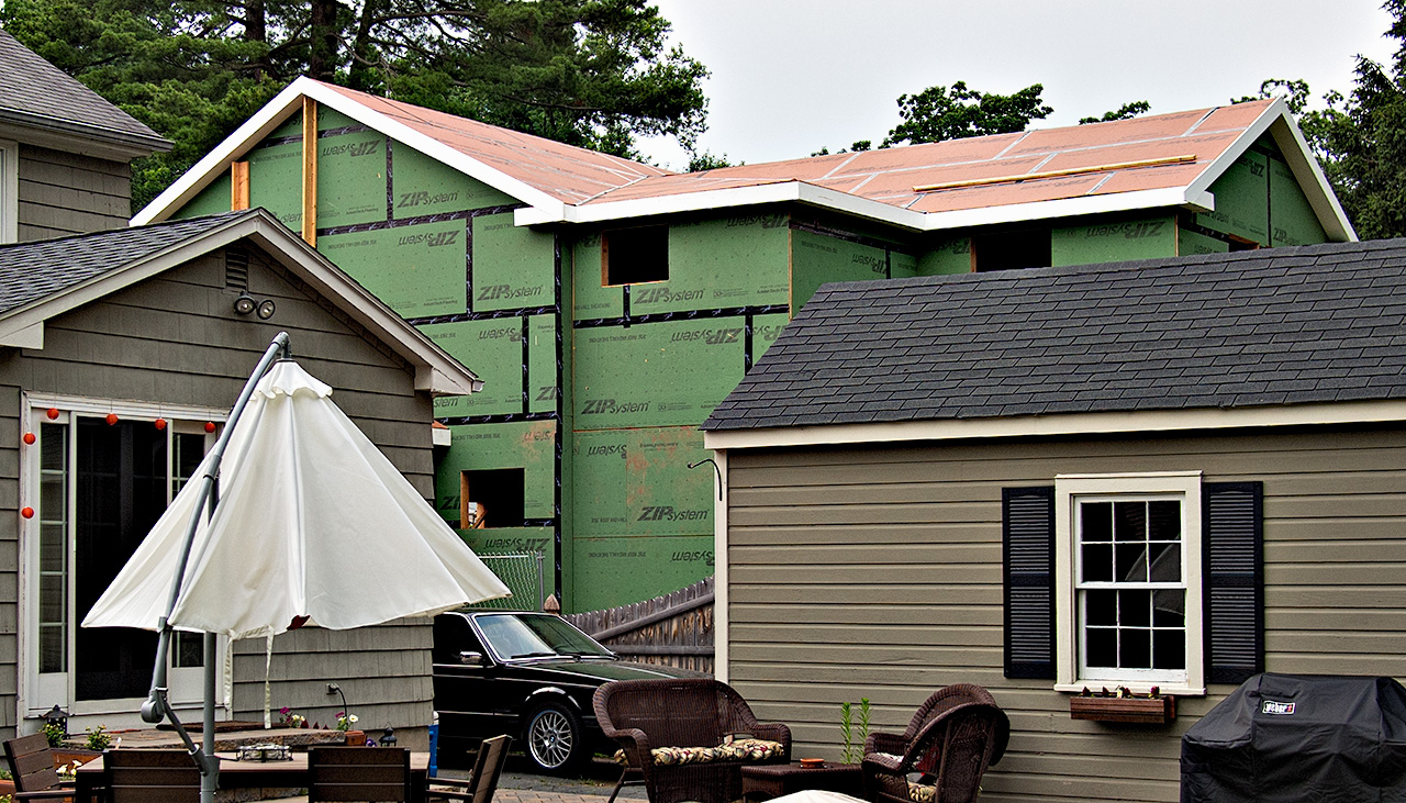 Being rebuilt after a fire.     (See below for image of burned home.)