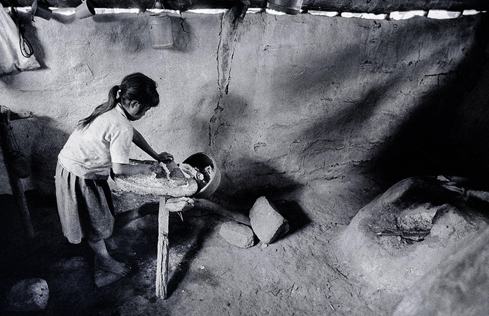 Selina Peraza Grinding Corn