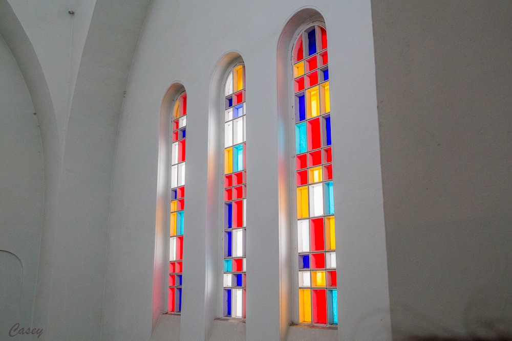 Stained glass windows light up.