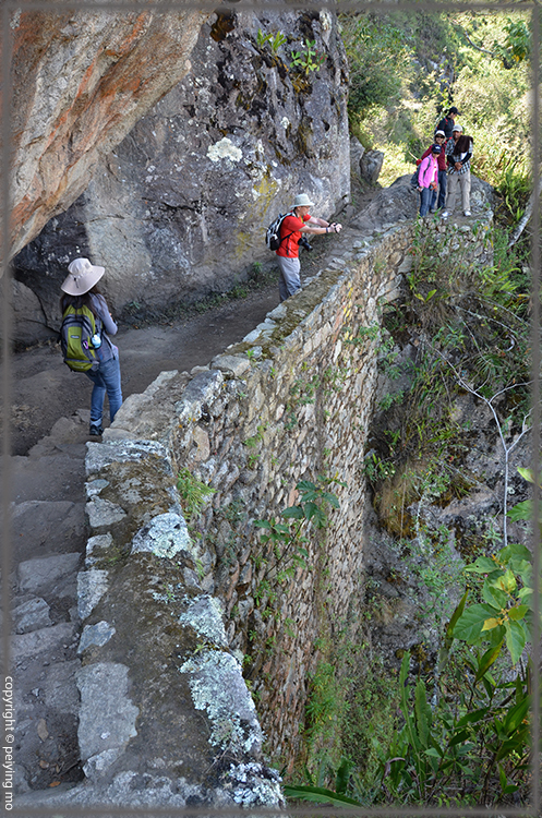 The trail is built on the side of sheer cliff