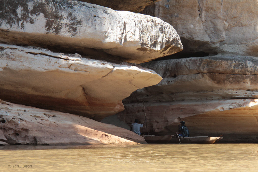 One of the caves in the limestone cliff
