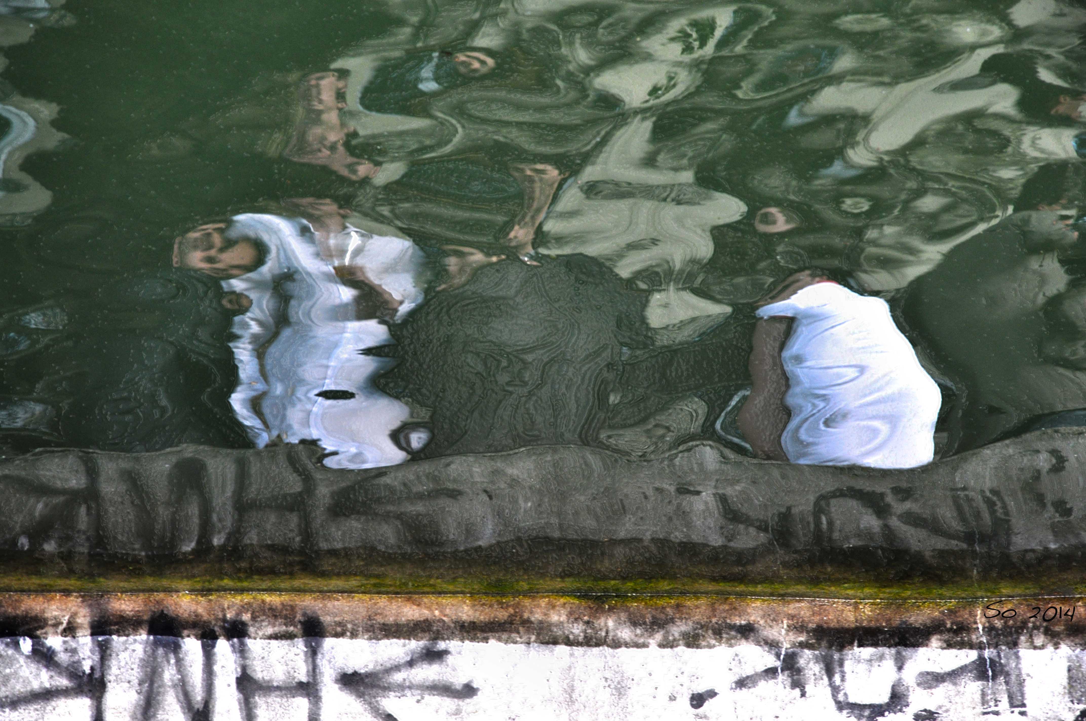 Faces by the waterbank