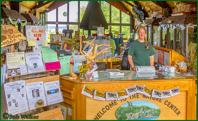 Employee Greets Folks Inside The Visitor Center