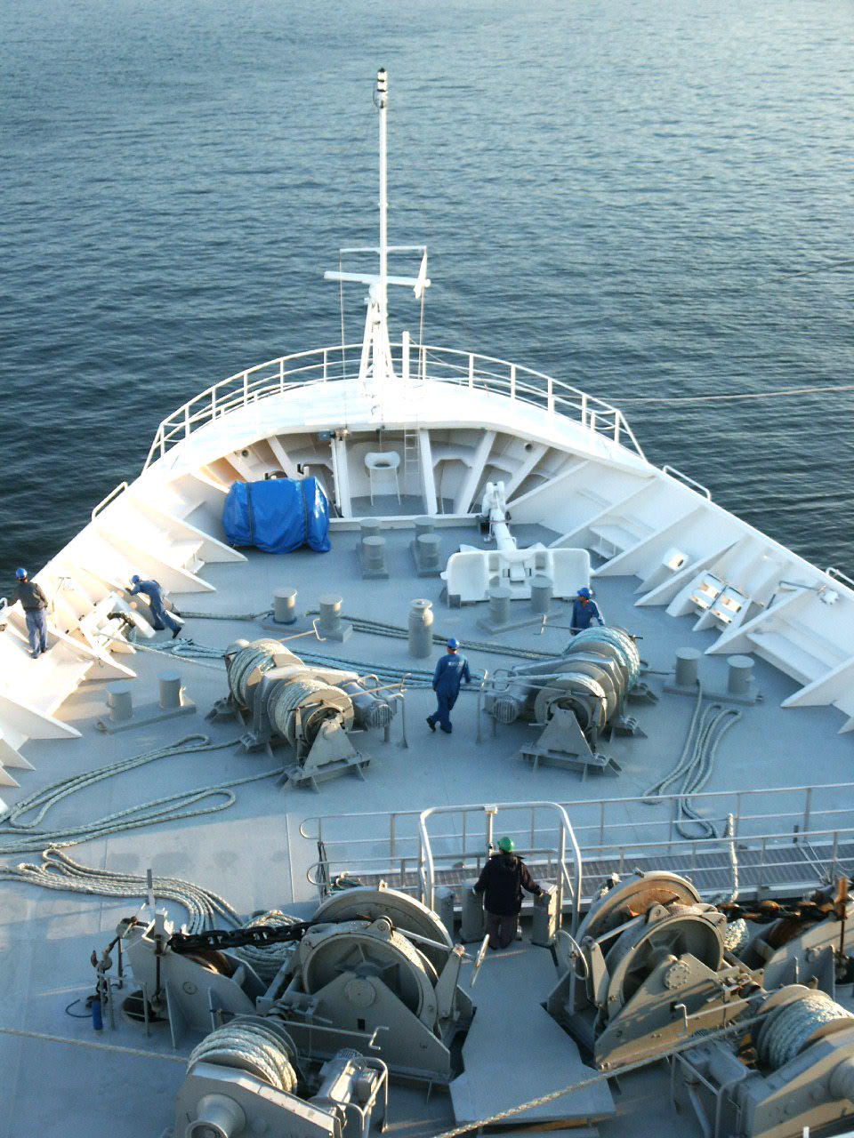 Deck crew getting ready for port call