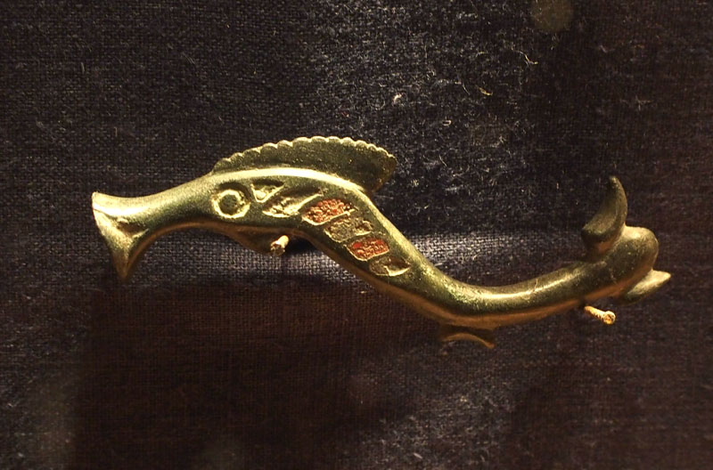 Gold swimming creature