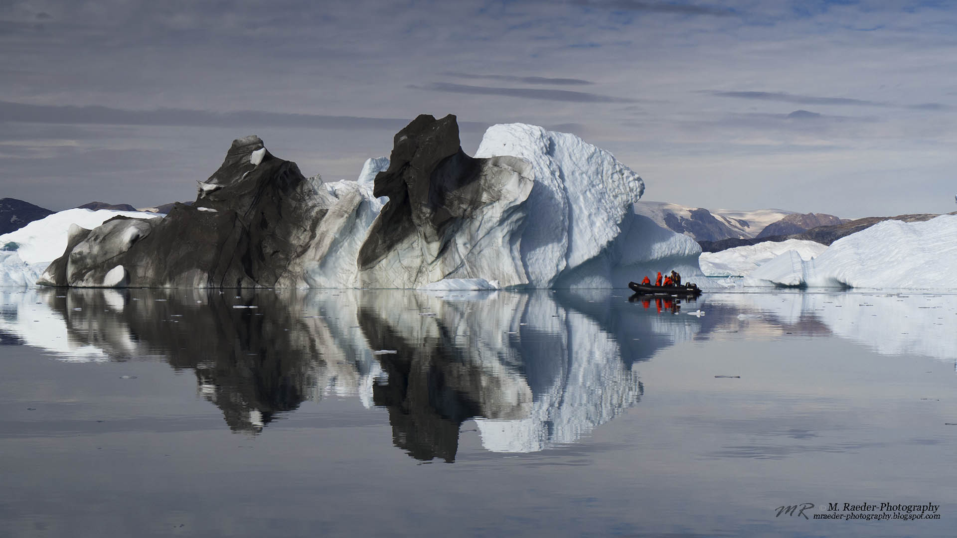 Cruising among gigantic icebergs