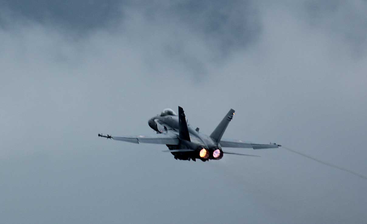 J-5012 heading into the clouds with afterburner running