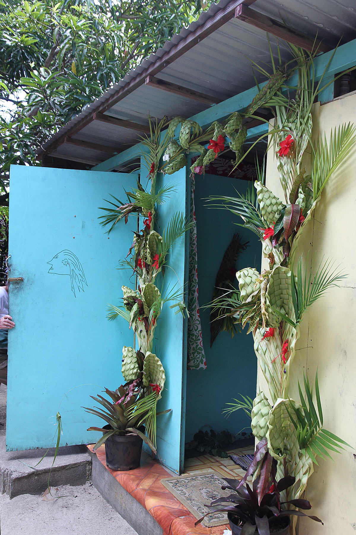 Bathrooms at batik store.  Drawings were confusing but we figured out which represented men & which women