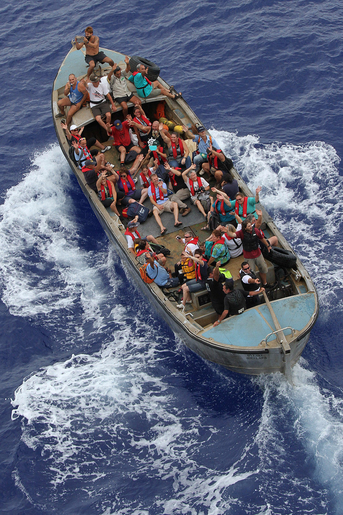 We took pics of them & waved & they took pics of us (once with a tablet) & waved. Whoosh, boat did a 360 & then they were off.