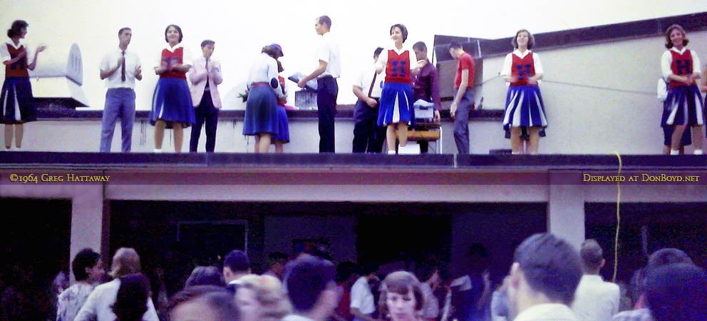 Fall 1964 - Hialeah High cheerleaders at the football pep rally on the roof outside the cafeteria at Hialeah High School