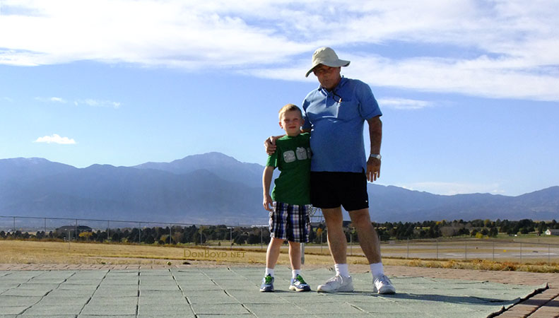October 2014 - Kyler and grandpa Don Boyd at Peterson AFB with Pikes Peak in the background