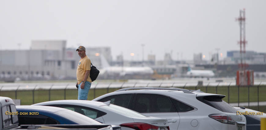June 2016 - Kev Cook waiting for aircraft to land on runway 9 at Miami International Airport