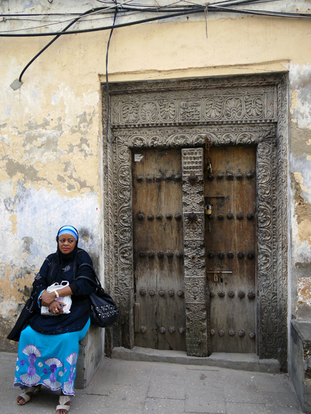 Woman and Door, Stonetown, Zanzibar, Tanzania.