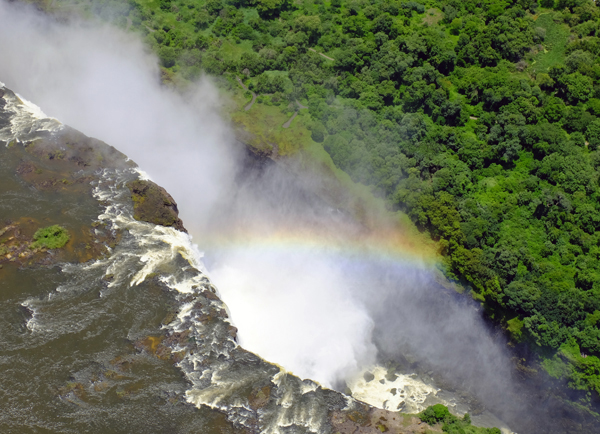 Rainbow over Victoria Falls, Zimbabwe.