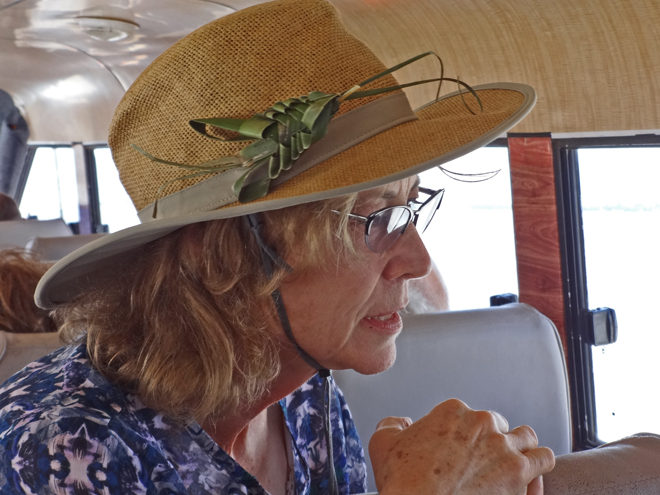 Stacy with her newly decorated hat -  a cricket made from a palm leaf