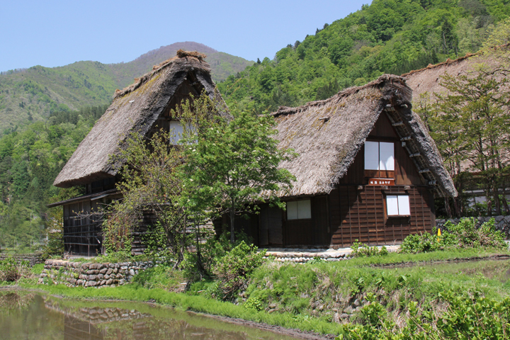 The Gassho-zukuri Village in Shirakawa-go tucked away in the surrounding mountains