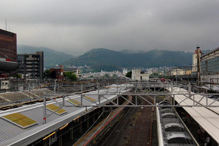 The main train station in Kyoto. We arrived here from Komatsu. Kyoto and surrounding mountains are in the background.