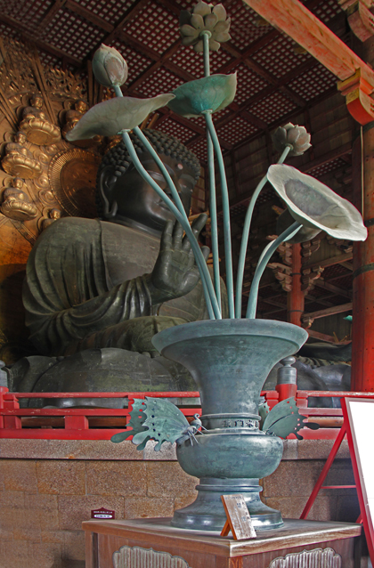 Massive, metal lotus vase and butterflies in front of the Great Buddha in Todai-ji Temples Main Hall in Nara Park in Nara