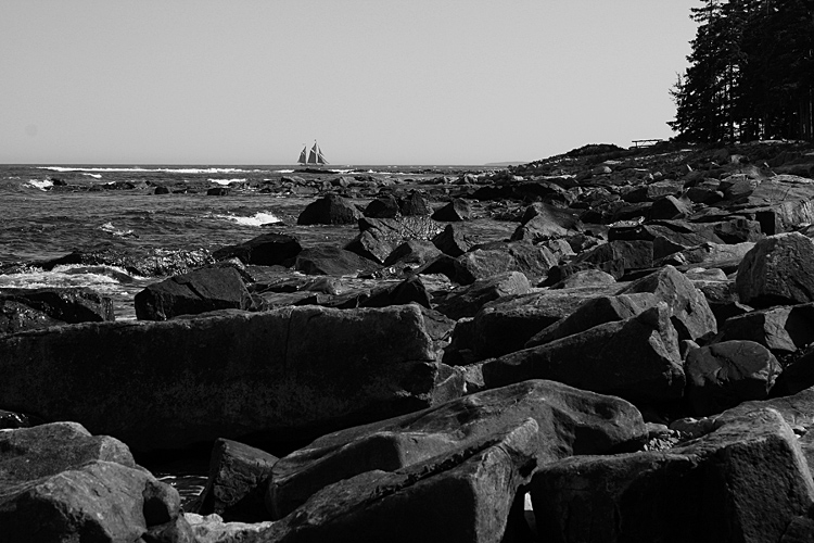 Schooner Past the Rocks Black and White.jpg